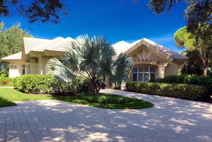 Bonita Bay Estate Home with glass walled dining room overlooking 10,000 gallon pond. - Bonita Springs, Florida