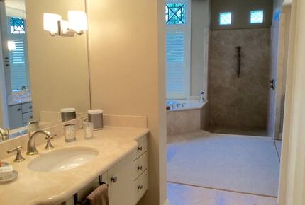 Bonita Bay Estate Home with glass walled dining room overlooking 10,000 gallon pond. - Bonita Springs, Florida