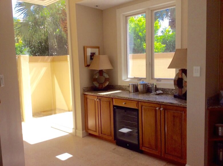 Bonita Bay Estate Home with glass walled dining room overlooking 10,000 gallon pond. - Bonita Springs, Florida