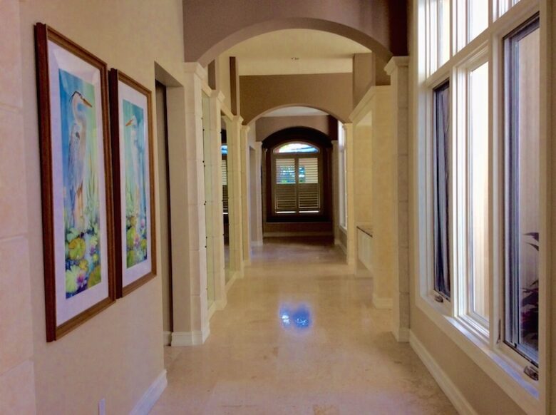 Bonita Bay Estate Home with glass walled dining room overlooking 10,000 gallon pond. - Bonita Springs, Florida