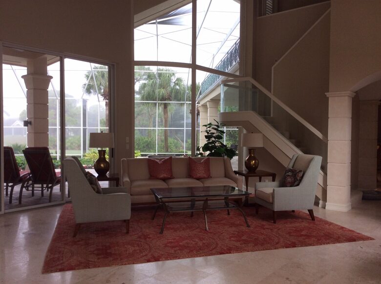 Bonita Bay Estate Home with glass walled dining room overlooking 10,000 gallon pond. - Bonita Springs, Florida