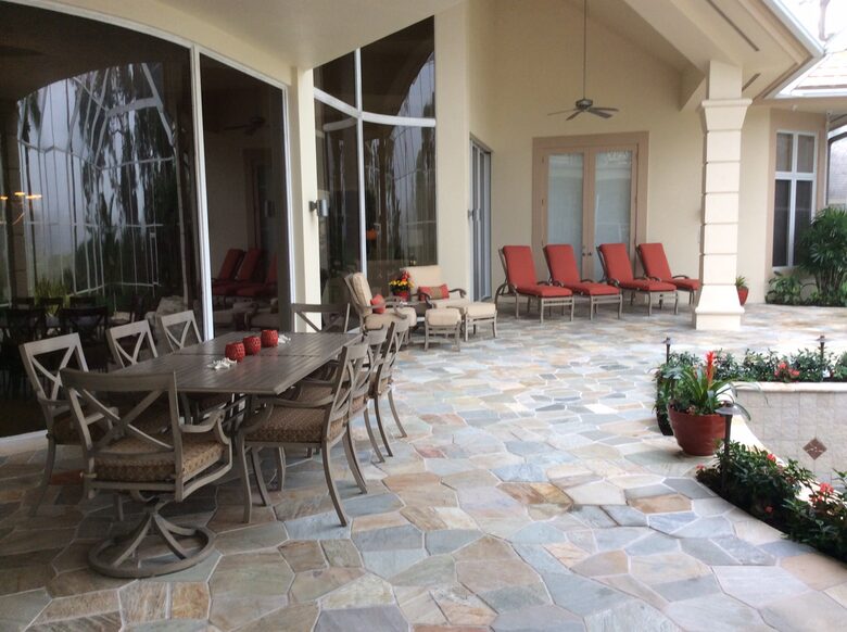 Bonita Bay Estate Home with glass walled dining room overlooking 10,000 gallon pond. - Bonita Springs, Florida