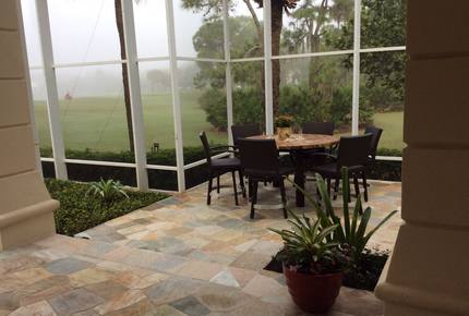 Bonita Bay Estate Home with glass walled dining room overlooking 10,000 gallon pond. - Bonita Springs, Florida