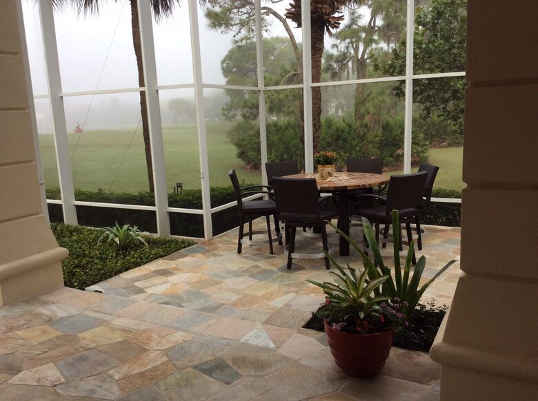 Bonita Bay Estate Home with glass walled dining room overlooking 10,000 gallon pond. - Bonita Springs, Florida