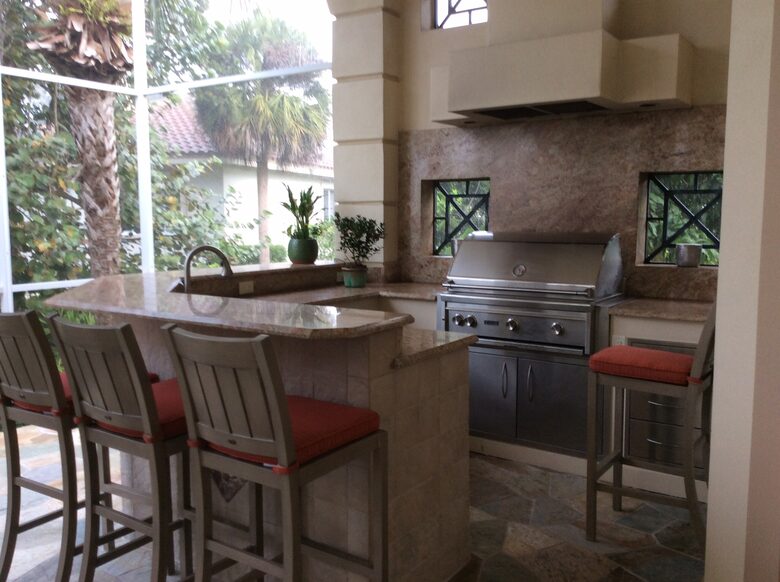 Bonita Bay Estate Home with glass walled dining room overlooking 10,000 gallon pond. - Bonita Springs, Florida