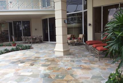 Bonita Bay Estate Home with glass walled dining room overlooking 10,000 gallon pond. - Bonita Springs, Florida