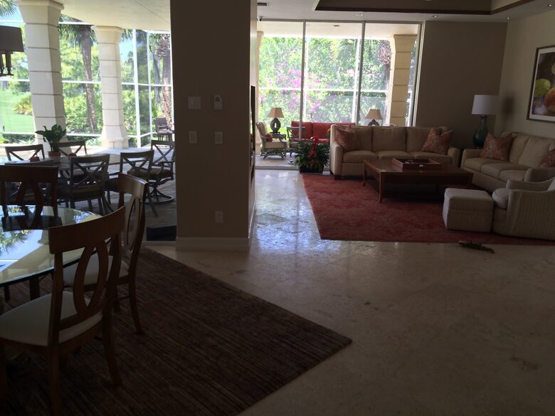 Bonita Bay Estate Home with glass walled dining room overlooking 10,000 gallon pond. - Bonita Springs, Florida