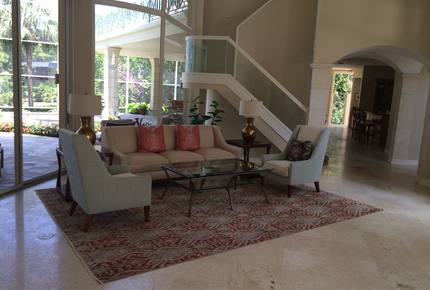 Bonita Bay Estate Home with glass walled dining room overlooking 10,000 gallon pond. - Bonita Springs, Florida