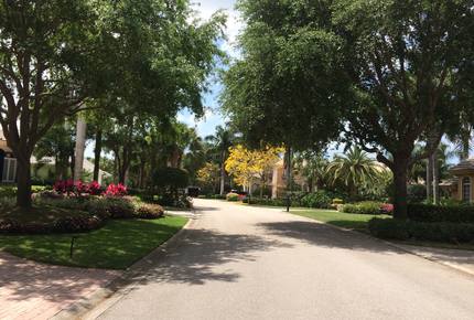 Bonita Bay Estate Home with glass walled dining room overlooking 10,000 gallon pond. - Bonita Springs, Florida