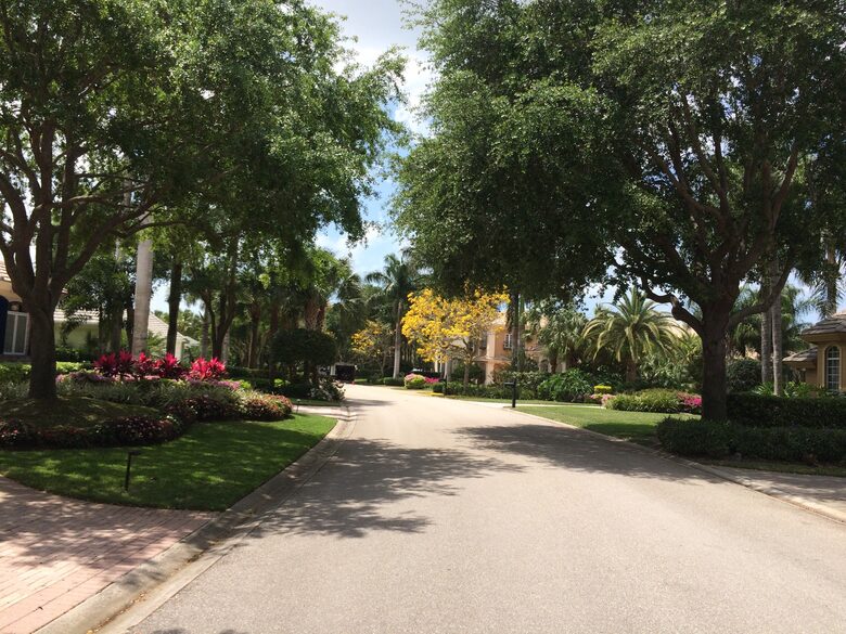 Bonita Bay Estate Home with glass walled dining room overlooking 10,000 gallon pond. - Bonita Springs, Florida
