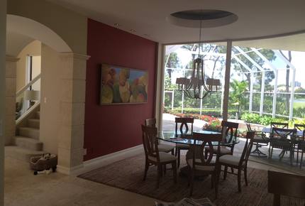 Bonita Bay Estate Home with glass walled dining room overlooking 10,000 gallon pond. - Bonita Springs, Florida
