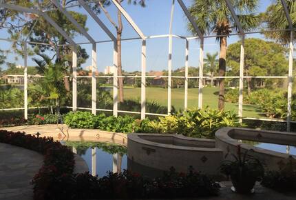 Bonita Bay Estate Home with glass walled dining room overlooking 10,000 gallon pond. - Bonita Springs, Florida