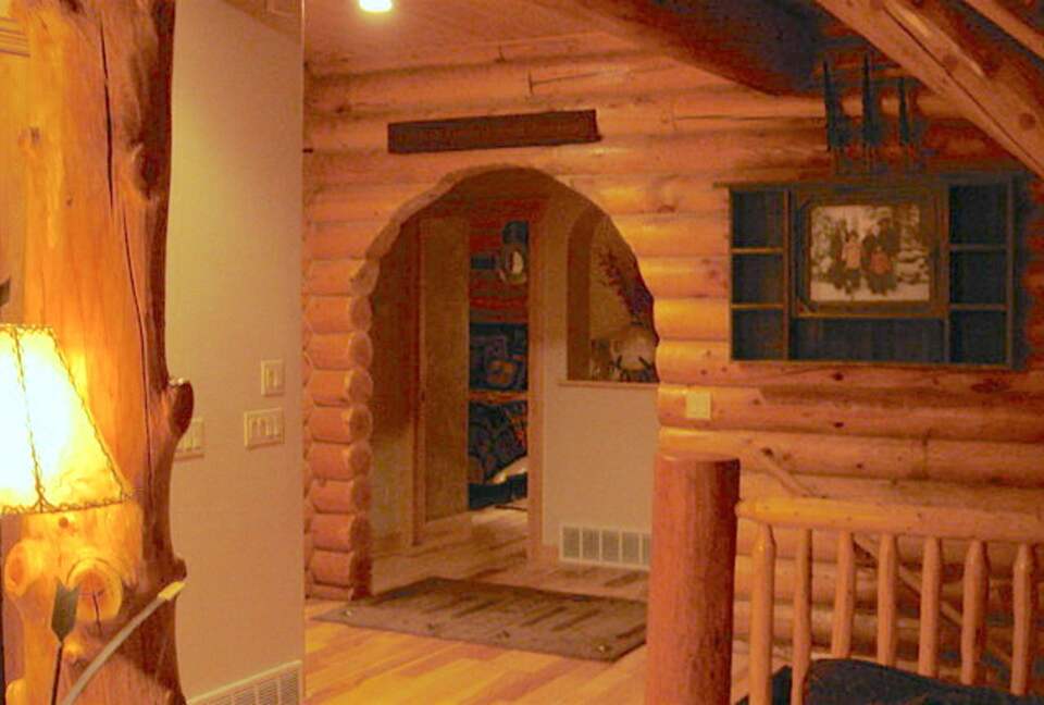 Archway to master and cowboy bedroom