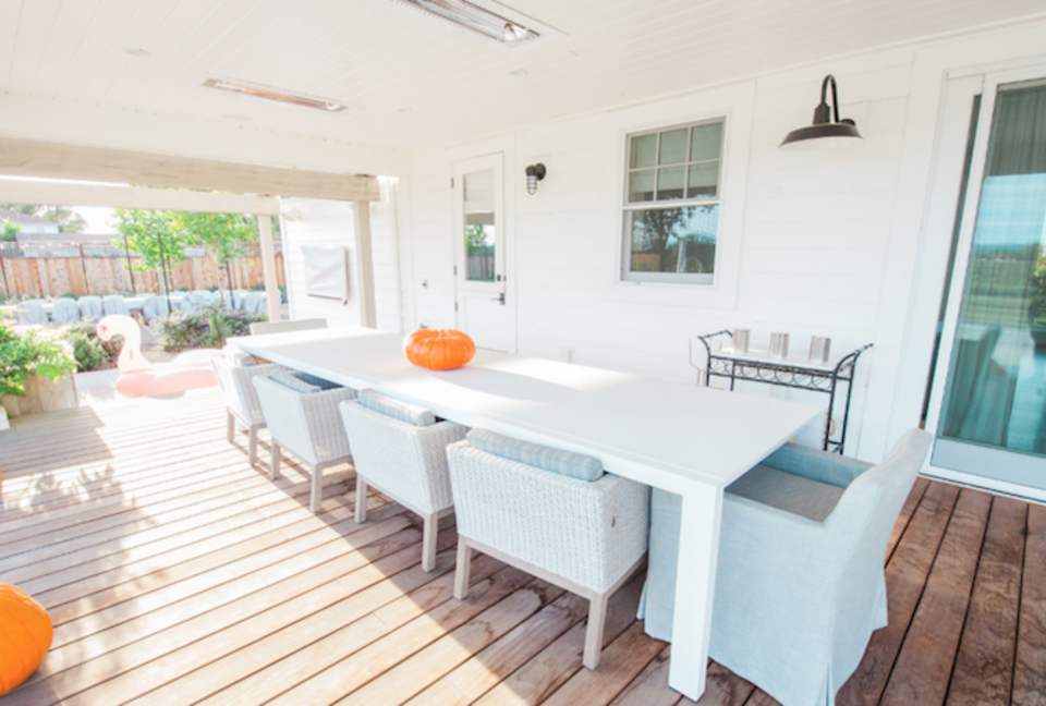 South deck dining area adjacent to the bar/barbecue area