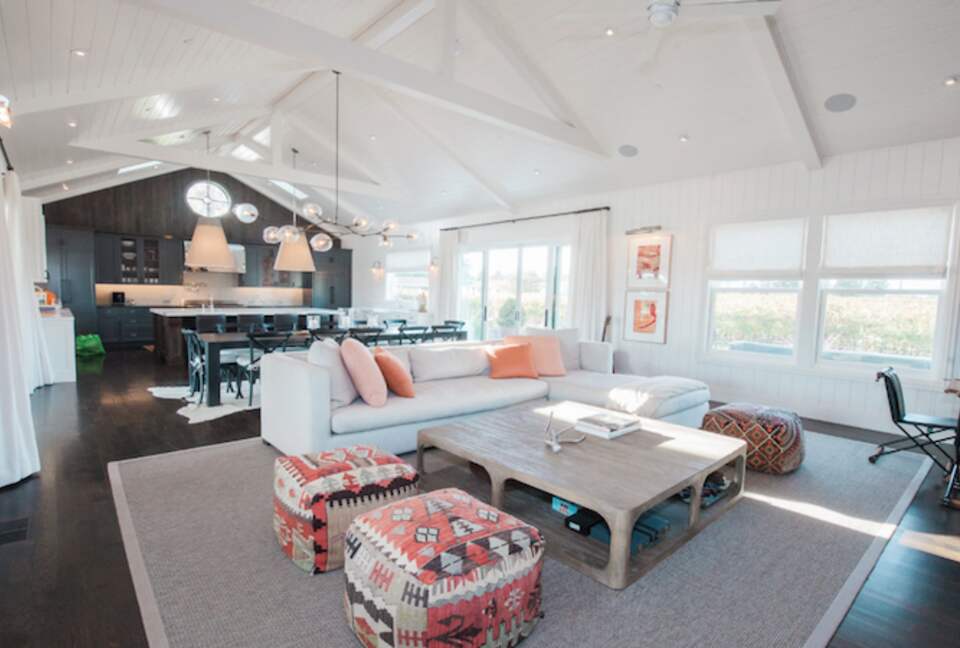 The great room with the living, dining. and kitchen areas.