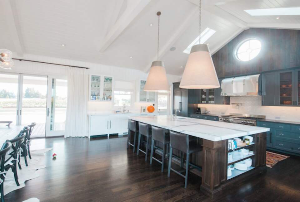 The kitchen island and chefs kitchen.