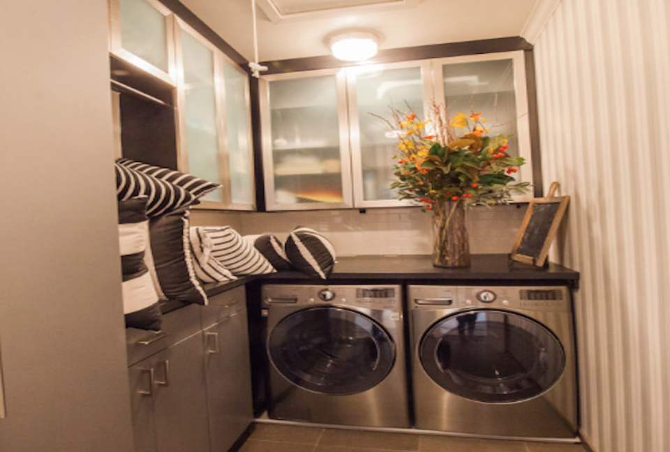 The laundry room immediately adjacent to the guest bedrooms.