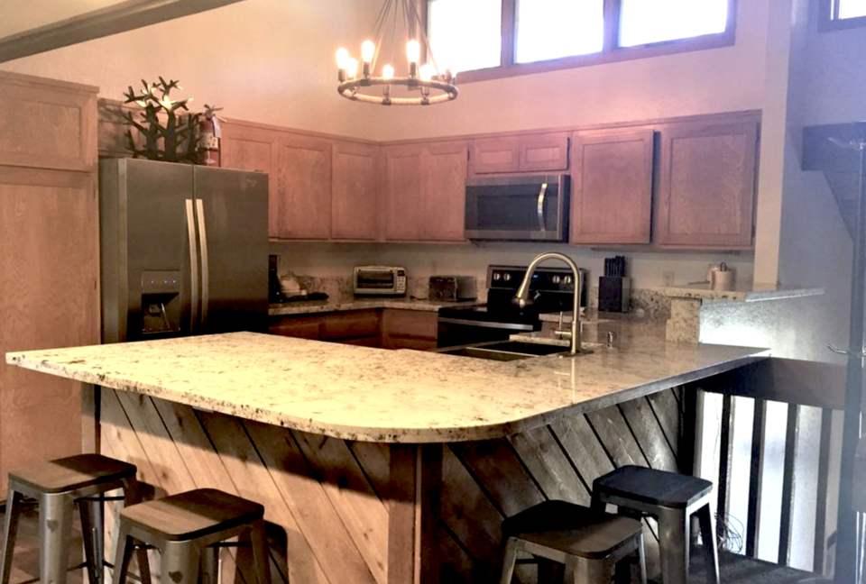 Kitchen with dining counter to seat 6