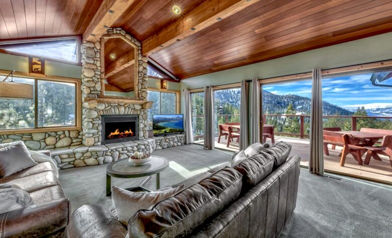 Main living space overlooking mountains and lake.