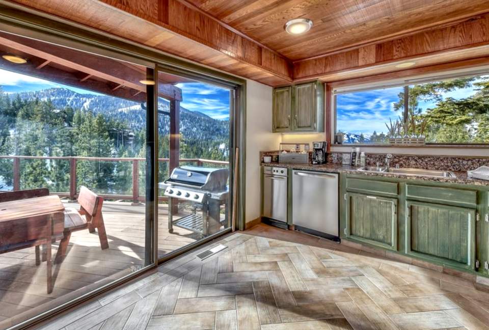 Just off the kitchen is Weber grill. Lovely grilling views!