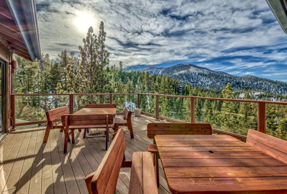 Top floor deck complete with seating for outdoor dining.