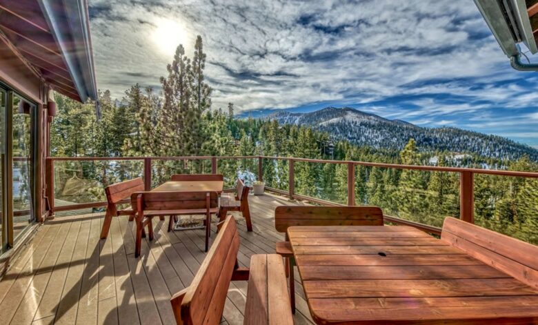 Top floor deck complete with seating for outdoor dining.