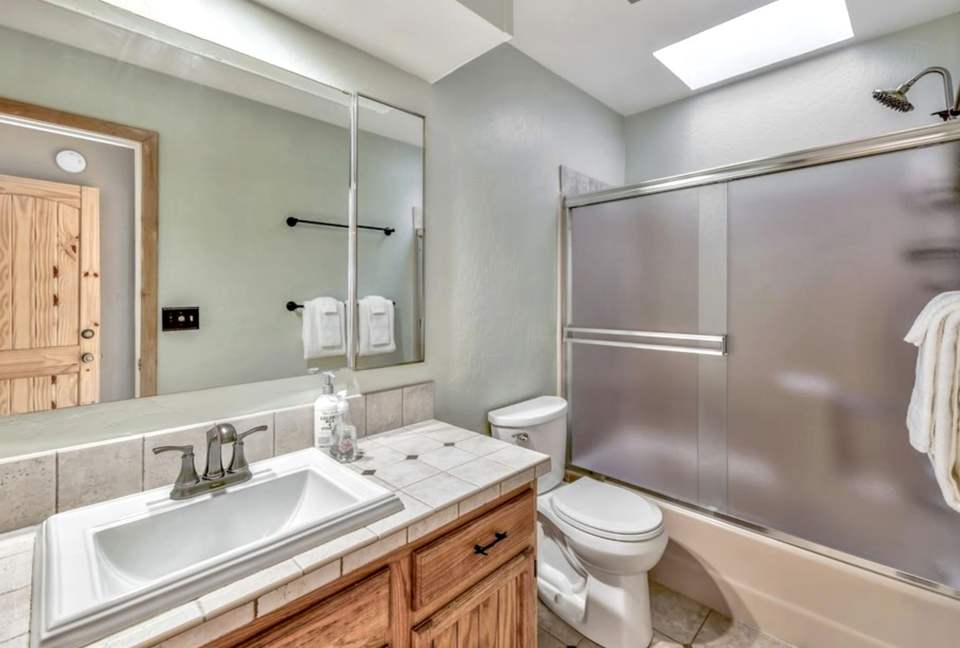 Upstairs bath with shower/tub combination.
