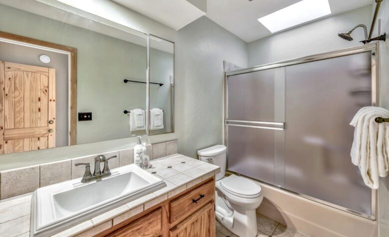 Upstairs bath with shower/tub combination.