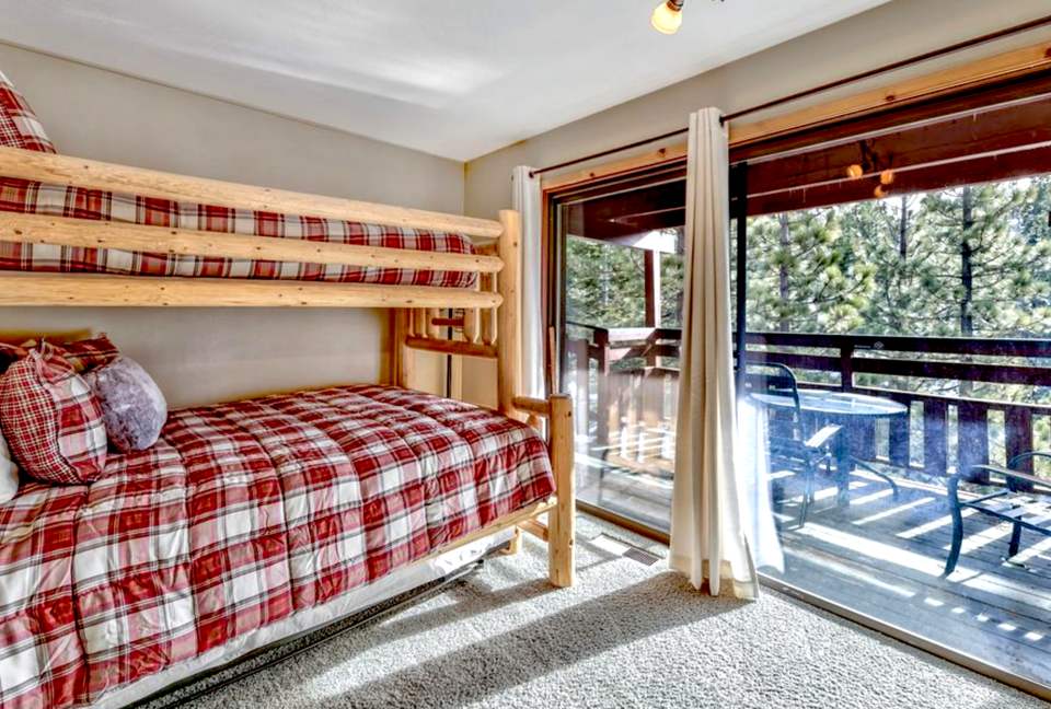 Bunkbed room queen/twin additional twin trundle and deck.