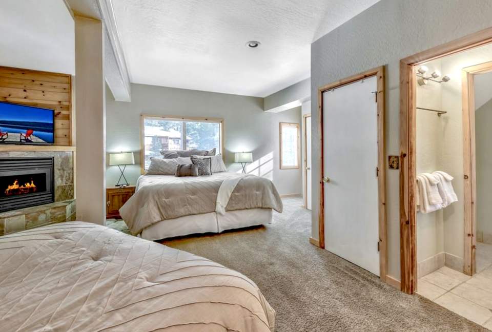 Master #1 with both King and Queen bed, private fireplace.