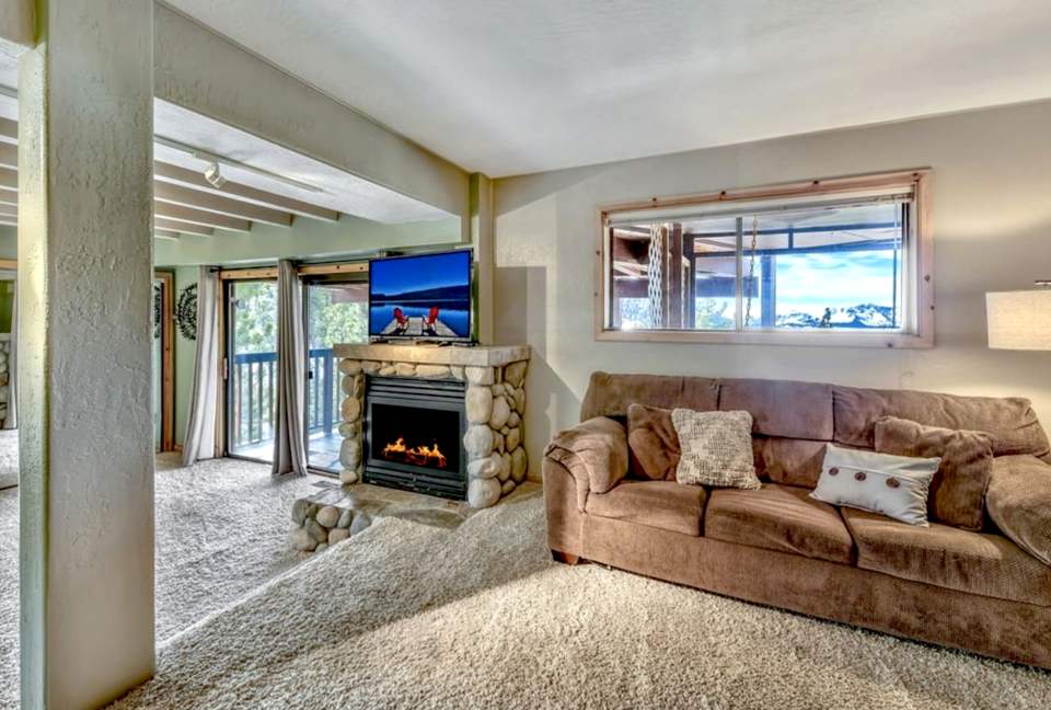 Main Master #2 rock fireplace and private seating area.