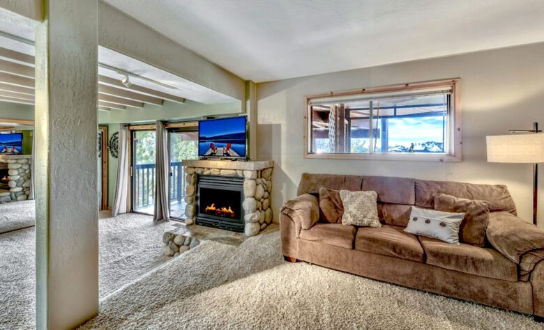 Main Master #2 rock fireplace and private seating area.