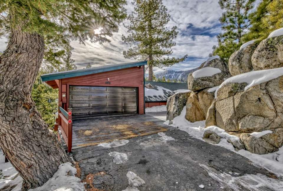 Parking in driveway for 3 mid-sized cars.