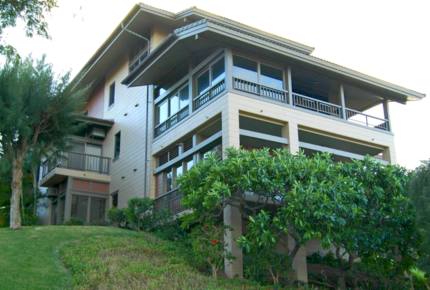 Exterior view on building; unit on top floor