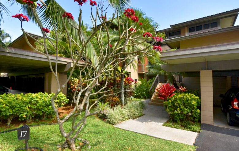 Entry way with assigned covered parking
