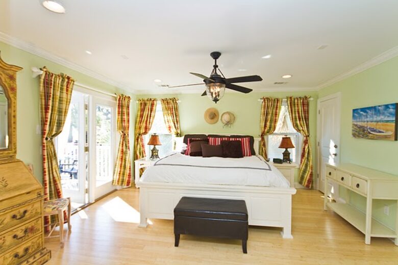 Home Exchange in Tybee Island, GA master bedroom with patio