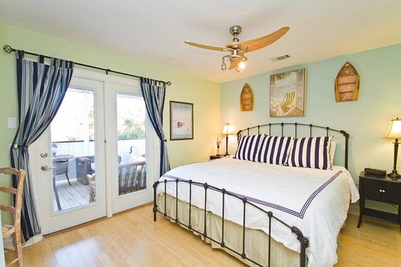 Home Exchange in Tybee Island, GA large bedroom with patio