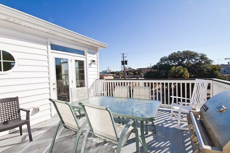 Home Exchange in Tybee Island, GA top patio with grill
