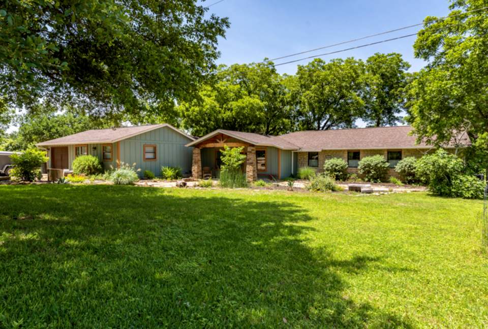 Shaded front yard with plenty of parking