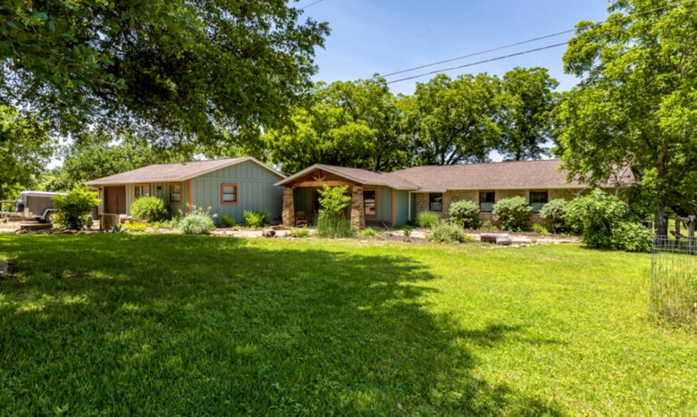 Shaded front yard with plenty of parking
