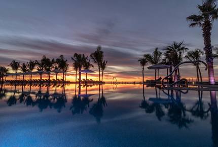 Home exchange in Los Cabos at Garza Blanca Resort, pool sunset