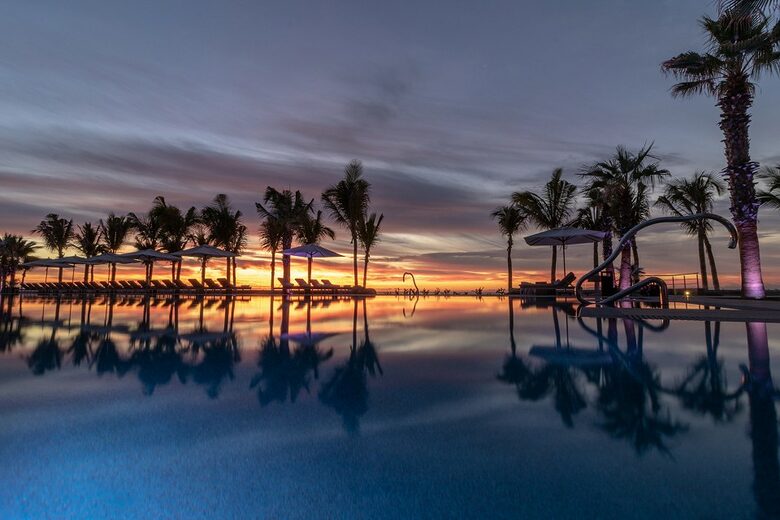 Home exchange in Los Cabos at Garza Blanca Resort, pool sunset