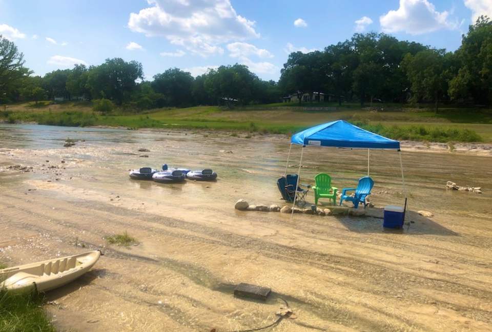 The water is more shallow right in front of the house