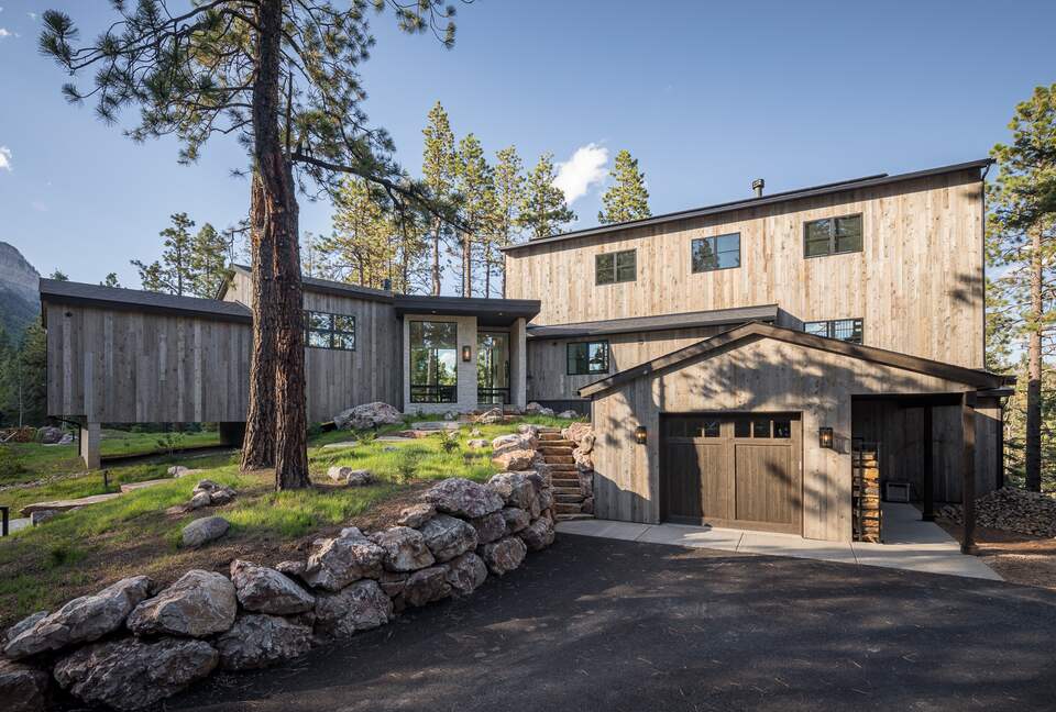 Exterior view of custom Durango Mountain Home and garage
