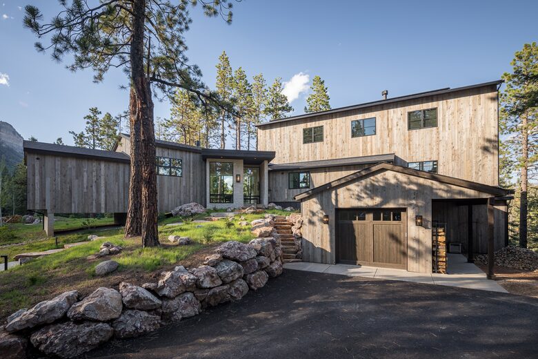 Exterior view of custom Durango Mountain Home and garage