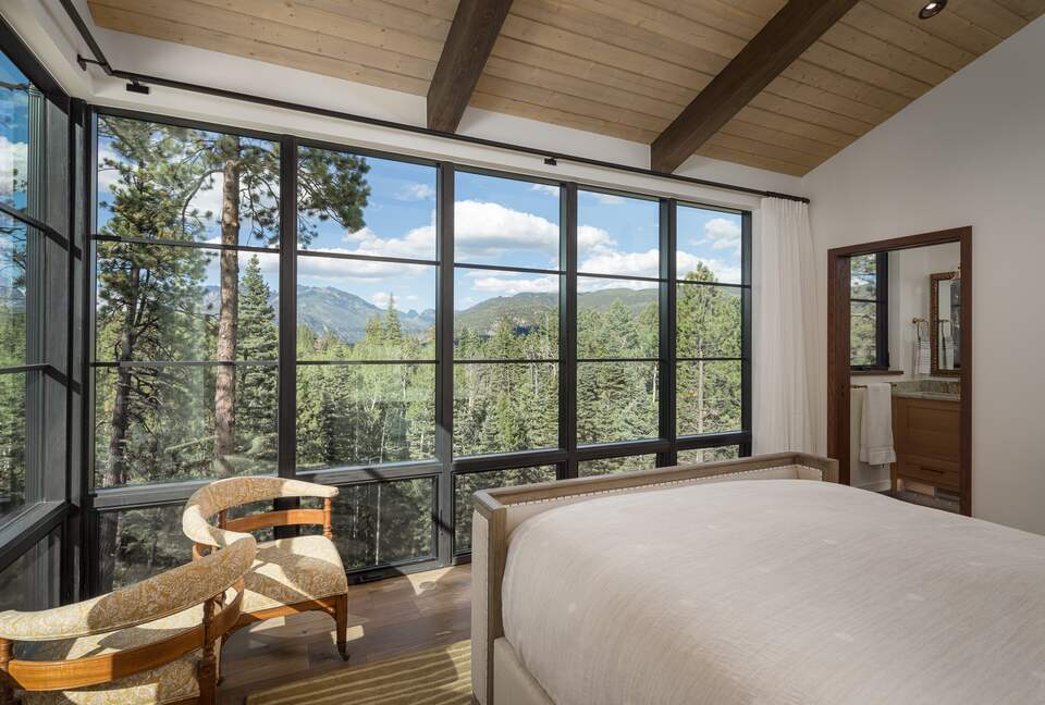 View from the master bed looking out towards the mountains
