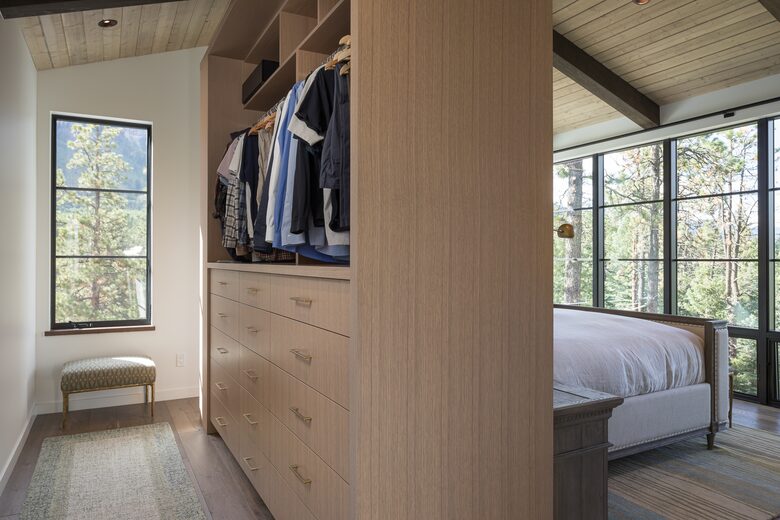 Built-in wardrobe behind the master bed