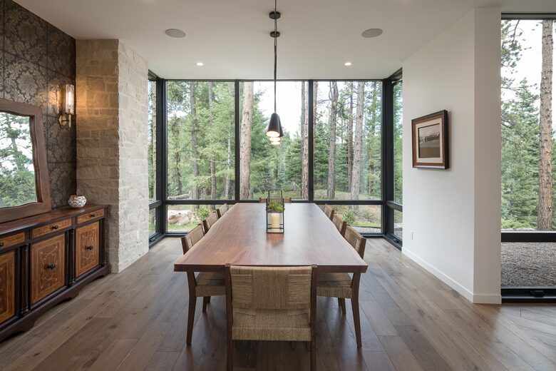 View from the head of the dining room table facing windows