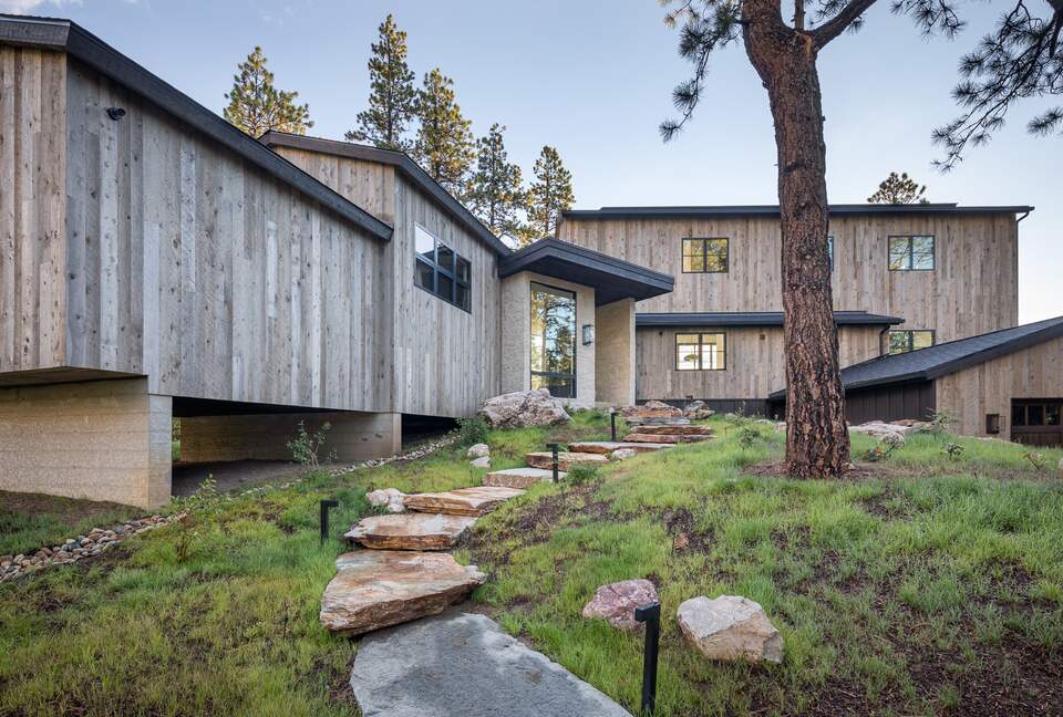 Stepping stones leading to custom Durango Mountain Home.