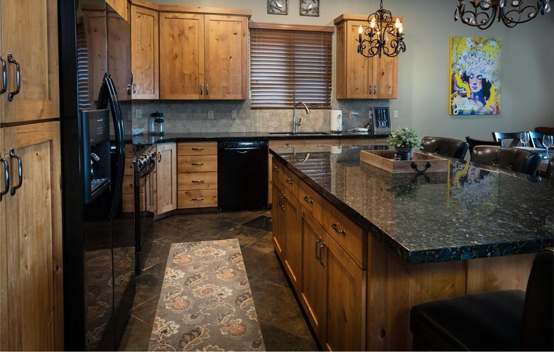 Kitchen with knotty alder cabinets and granite countertops